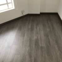 a wood floor in a roomGọi Ngay: 0935.338.338 Tư Vấn Qua Zalo Để Nhận ưu đãi & báo giá. Tư vấn & xem mẫu tại nhà [MIỄN PHÍ].