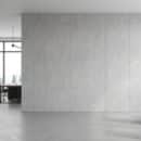 Ốp tường nhựa Nano vân bê tông xám nhạt giá rẻ mặt tường lớn văn phòng open space phong cách Industrial Minimalist sàn bê tông mài cửa kính đen TP.HCM