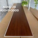 Tấm Lamri nhựa giả gỗ Nano NA29 vân walnut nâu đậm bề mặt phẳng bản rộng 400x9x3000mm