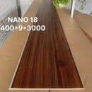 Tấm nhựa Nano NA18 vân gỗ walnut nâu đậm kích thước 400x9x3000mm bản rộng ốp tường trần chống ẩm cao cấp